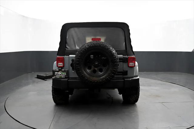 used 2014 Jeep Wrangler Unlimited car, priced at $12,695