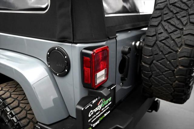 used 2014 Jeep Wrangler Unlimited car, priced at $12,695