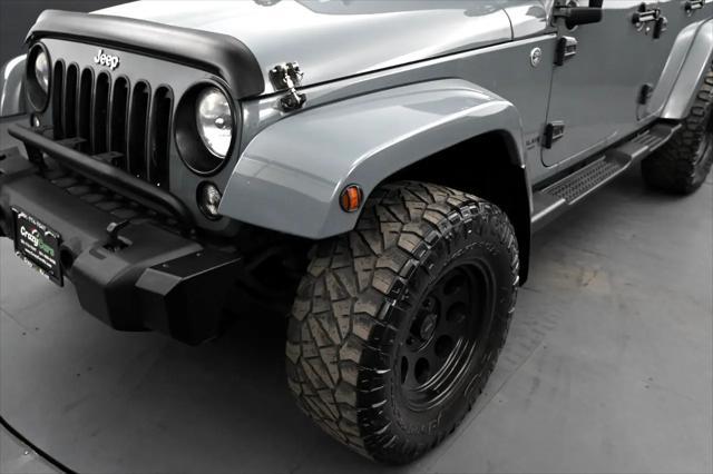 used 2014 Jeep Wrangler Unlimited car, priced at $12,695