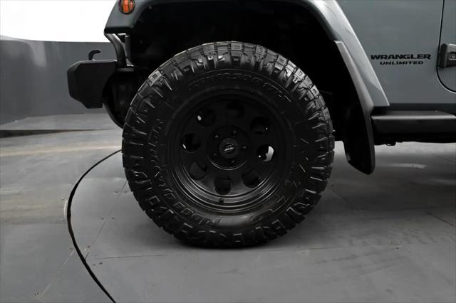 used 2014 Jeep Wrangler Unlimited car, priced at $12,695