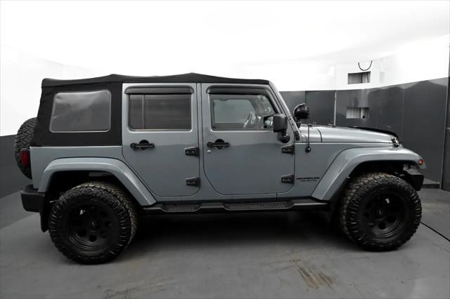 used 2014 Jeep Wrangler Unlimited car, priced at $12,695