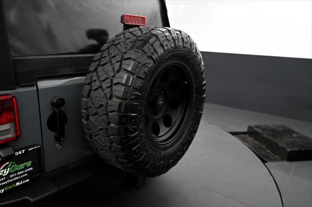 used 2014 Jeep Wrangler Unlimited car, priced at $12,695