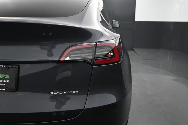 used 2021 Tesla Model Y car, priced at $23,495