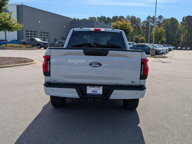 new 2025 Ford F-150 Lightning car, priced at $73,990
