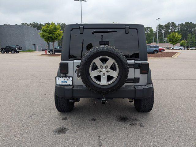 used 2015 Jeep Wrangler Unlimited car, priced at $16,995