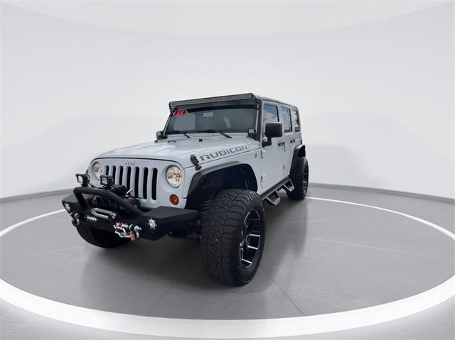 used 2013 Jeep Wrangler Unlimited car, priced at $19,994