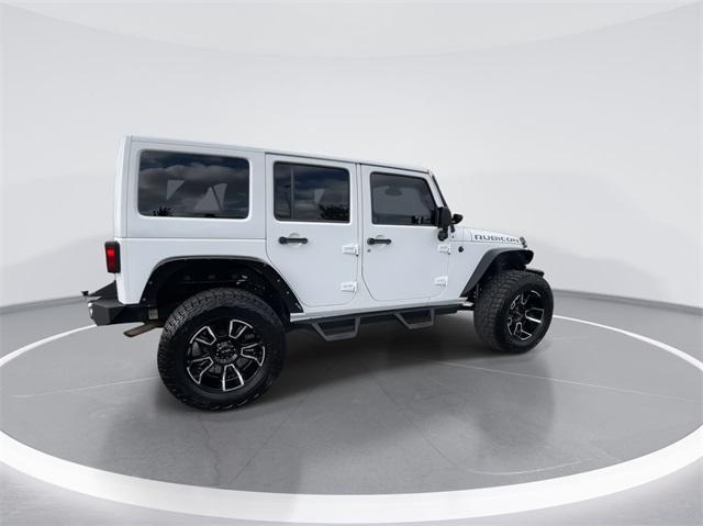 used 2013 Jeep Wrangler Unlimited car, priced at $19,994