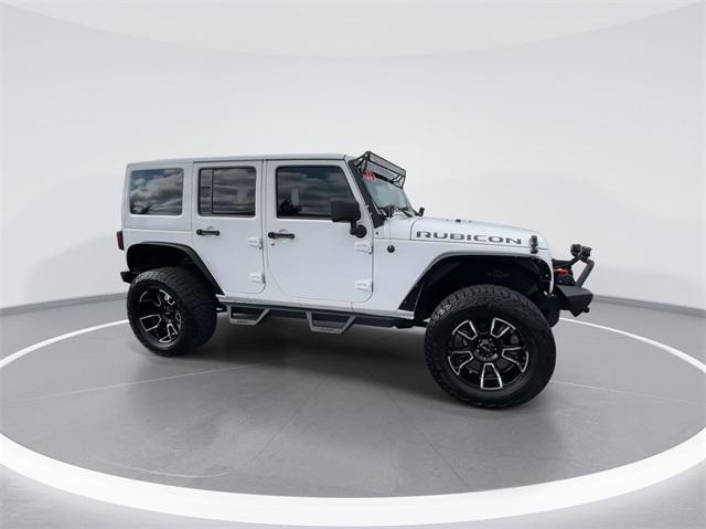 used 2013 Jeep Wrangler Unlimited car, priced at $19,994