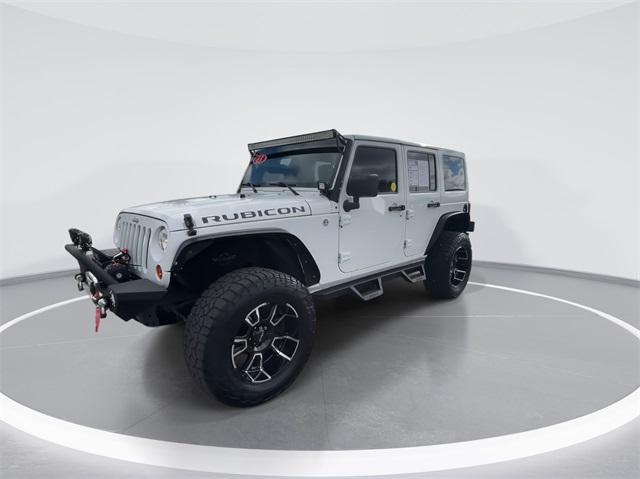 used 2013 Jeep Wrangler Unlimited car, priced at $19,994