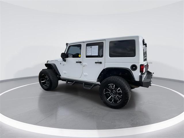 used 2013 Jeep Wrangler Unlimited car, priced at $19,994