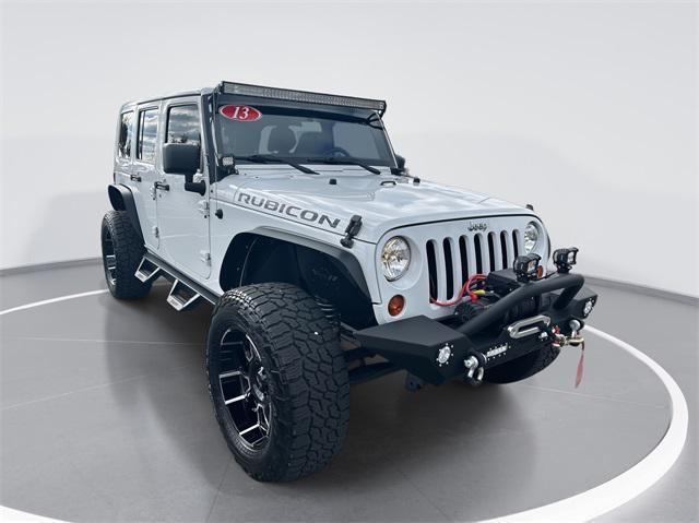 used 2013 Jeep Wrangler Unlimited car, priced at $19,994