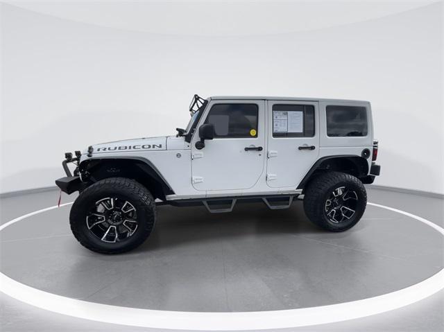 used 2013 Jeep Wrangler Unlimited car, priced at $19,994