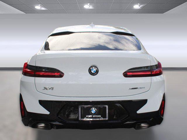 new 2025 BMW X4 car, priced at $65,775