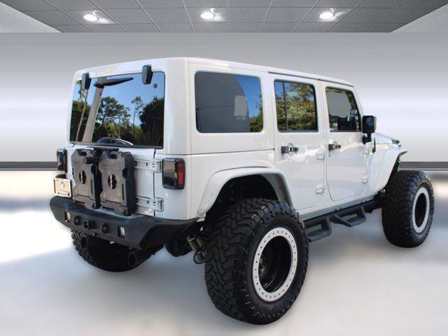 used 2013 Jeep Wrangler Unlimited car, priced at $14,999
