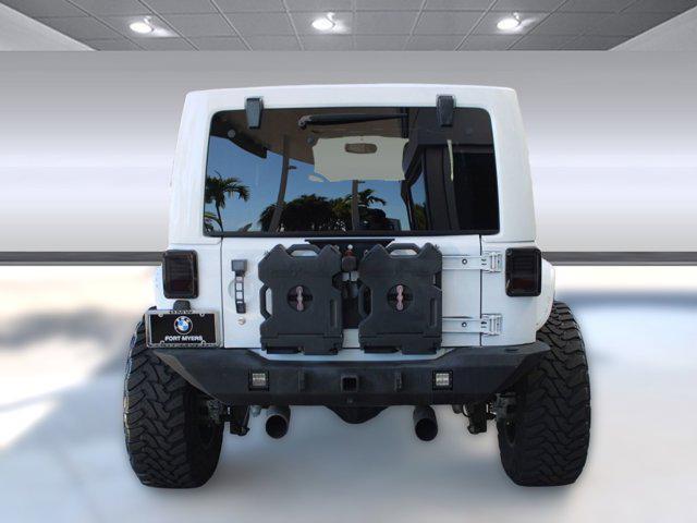 used 2013 Jeep Wrangler Unlimited car, priced at $14,999