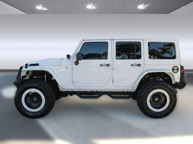 used 2013 Jeep Wrangler Unlimited car, priced at $14,999