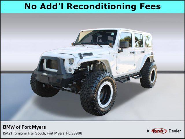 used 2013 Jeep Wrangler Unlimited car, priced at $14,999