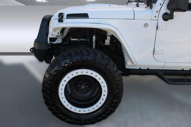used 2013 Jeep Wrangler Unlimited car, priced at $14,999