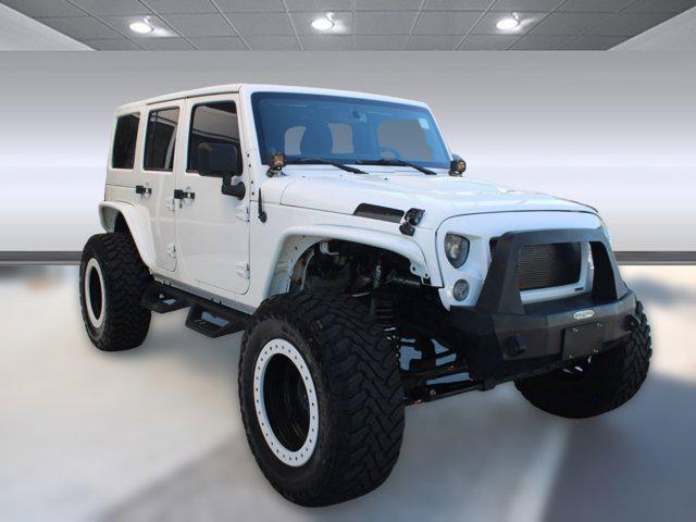 used 2013 Jeep Wrangler Unlimited car, priced at $14,999