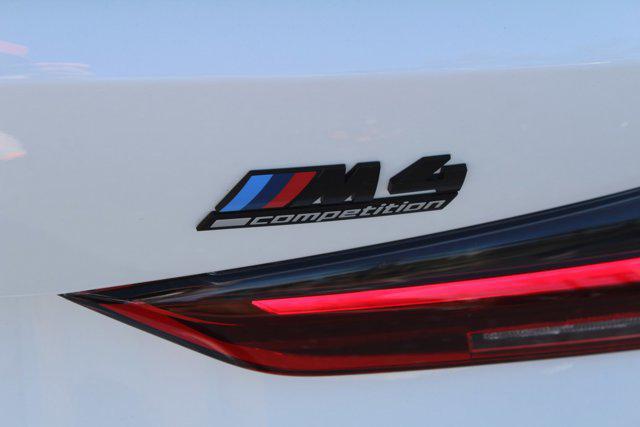 used 2024 BMW M4 car, priced at $81,999