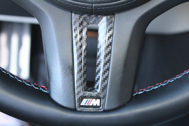 used 2024 BMW M4 car, priced at $81,999