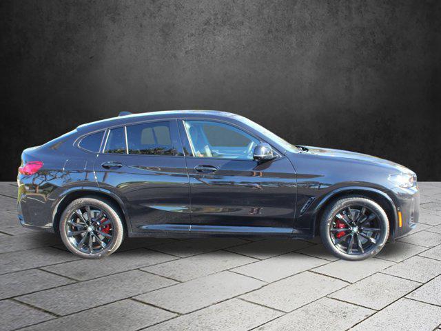 used 2023 BMW X4 car, priced at $56,998