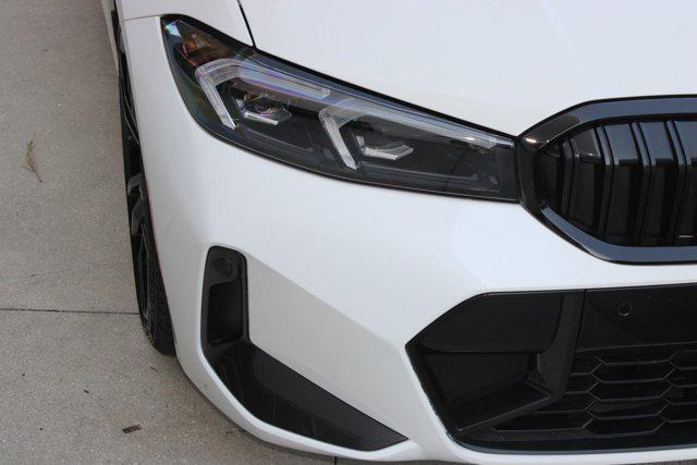 used 2023 BMW 330 car, priced at $40,498