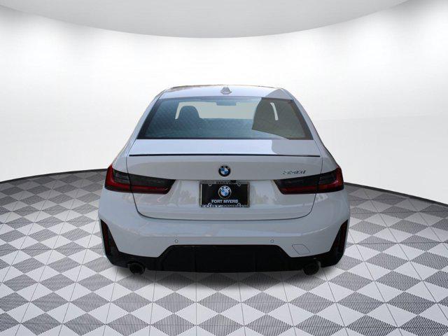 used 2023 BMW 330 car, priced at $40,498