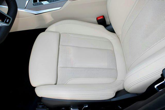 new 2025 BMW 330 car, priced at $54,075