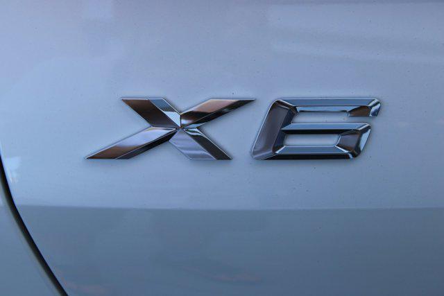 used 2024 BMW X6 car, priced at $76,999