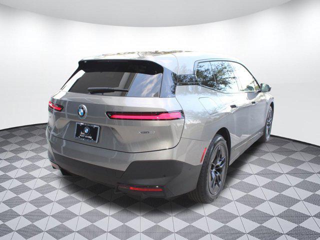 used 2024 BMW iX car, priced at $59,999