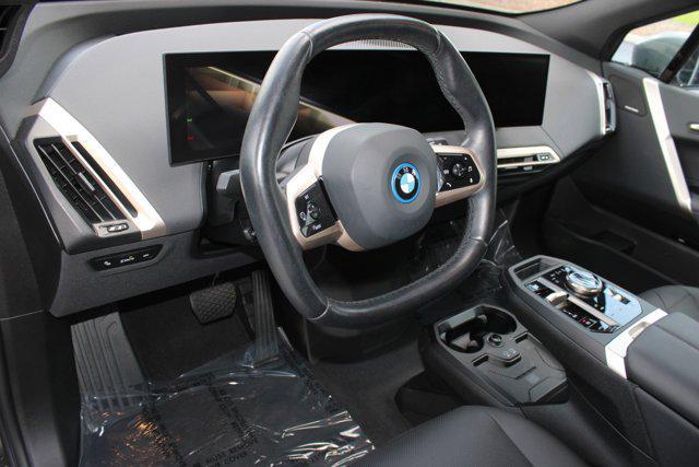 used 2024 BMW iX car, priced at $59,999