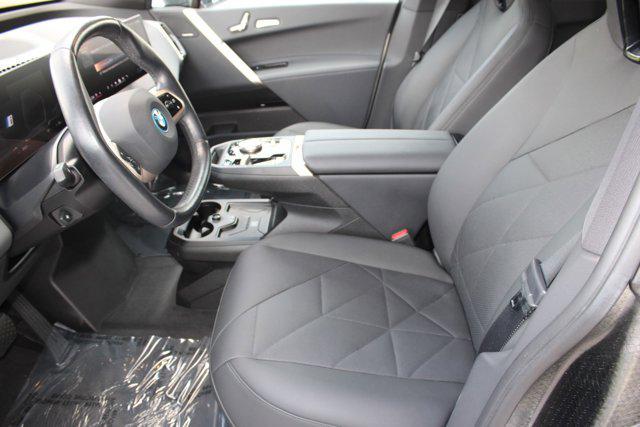 used 2024 BMW iX car, priced at $59,999