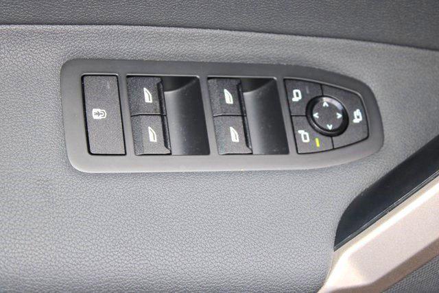 used 2024 BMW iX car, priced at $56,998
