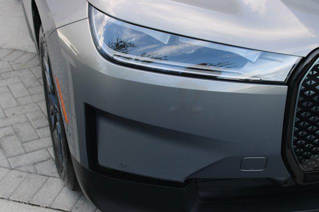 used 2024 BMW iX car, priced at $59,999