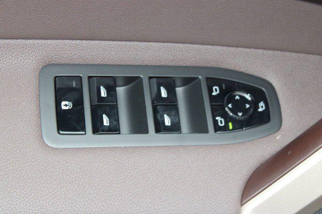 new 2026 BMW iX car, priced at $87,920