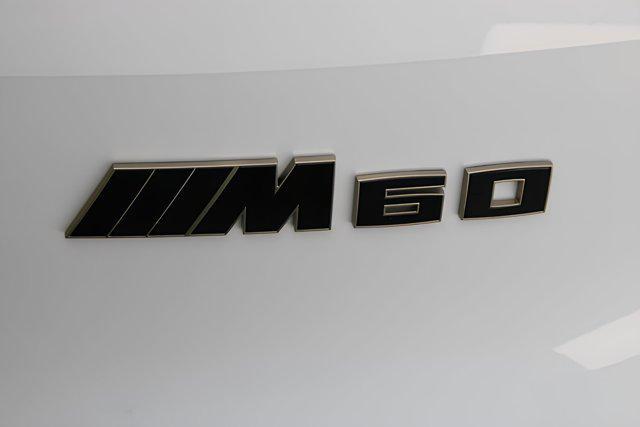 new 2025 BMW iX car, priced at $113,625