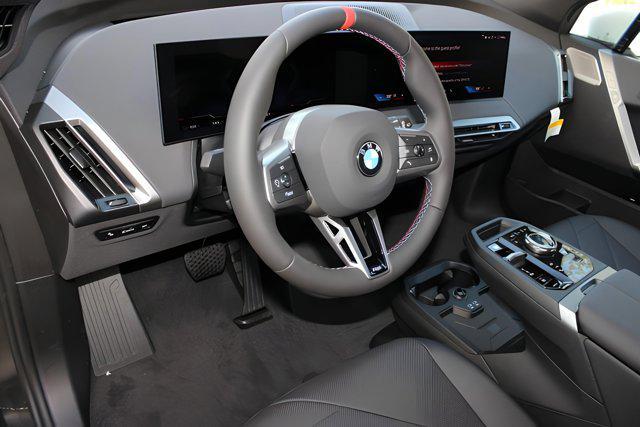 new 2025 BMW iX car, priced at $113,625