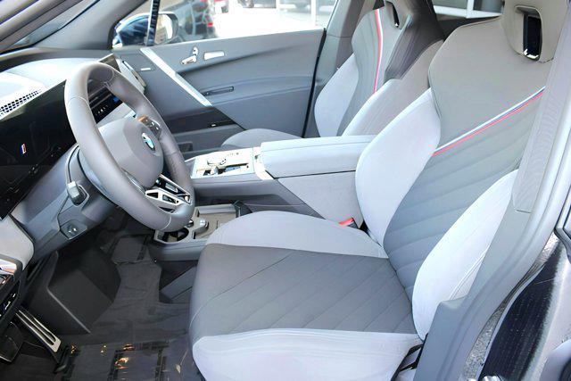 new 2026 BMW iX car, priced at $95,725