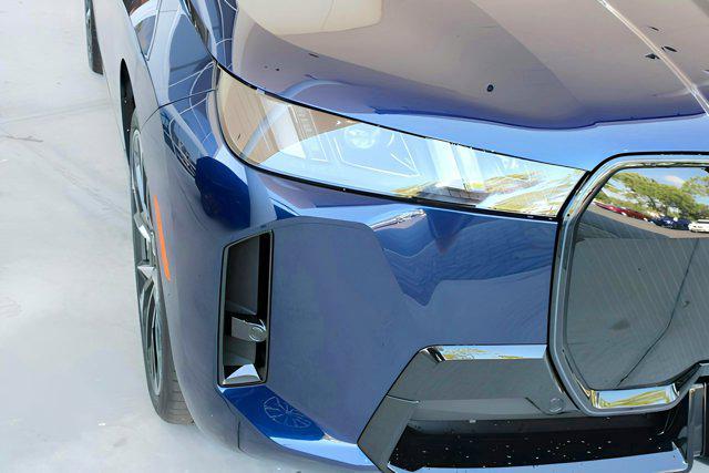 new 2026 BMW iX car, priced at $95,725
