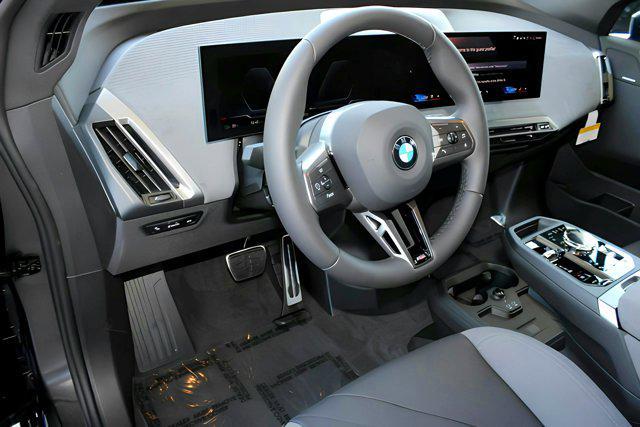 new 2026 BMW iX car, priced at $95,725