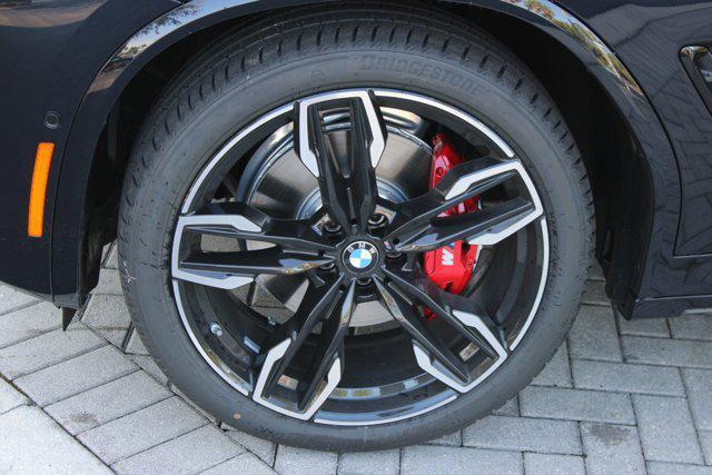 new 2025 BMW X4 car, priced at $76,540