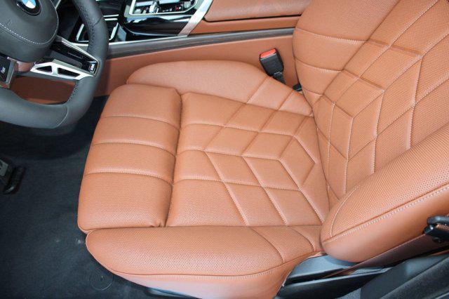new 2025 BMW 740 car, priced at $110,880