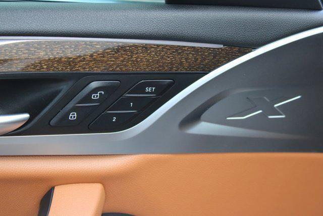 used 2023 BMW X4 car, priced at $42,797
