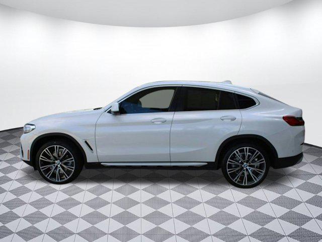 used 2023 BMW X4 car, priced at $42,797