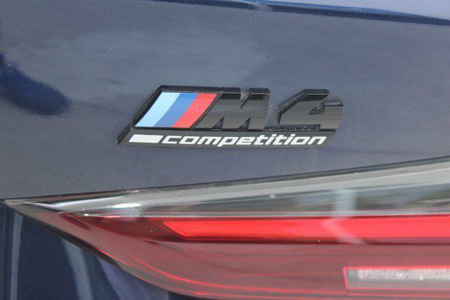 used 2024 BMW M4 car, priced at $67,898