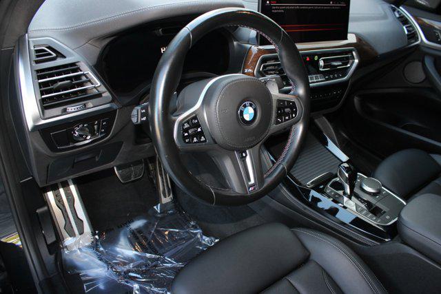 used 2024 BMW X4 car, priced at $56,999