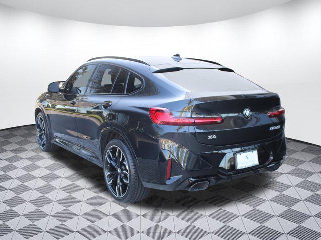 used 2024 BMW X4 car, priced at $56,999