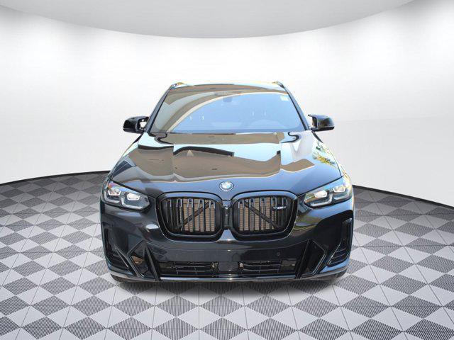 used 2024 BMW X4 car, priced at $56,999