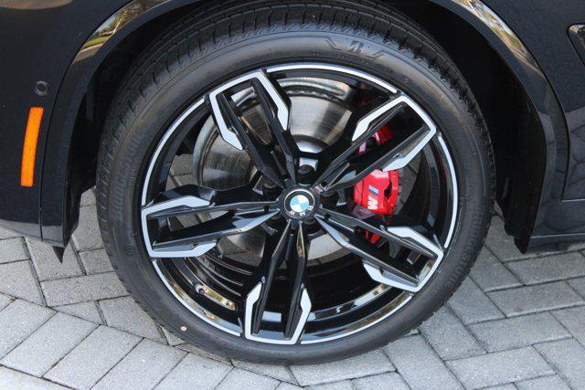 used 2024 BMW X4 car, priced at $56,999